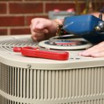 An AC expert demonstrates how to fix overheated air conditioner.